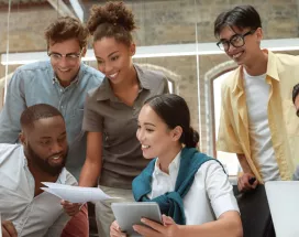Team collaborating around a table at work