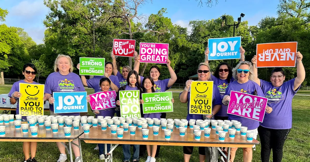 holding encouraging signs 