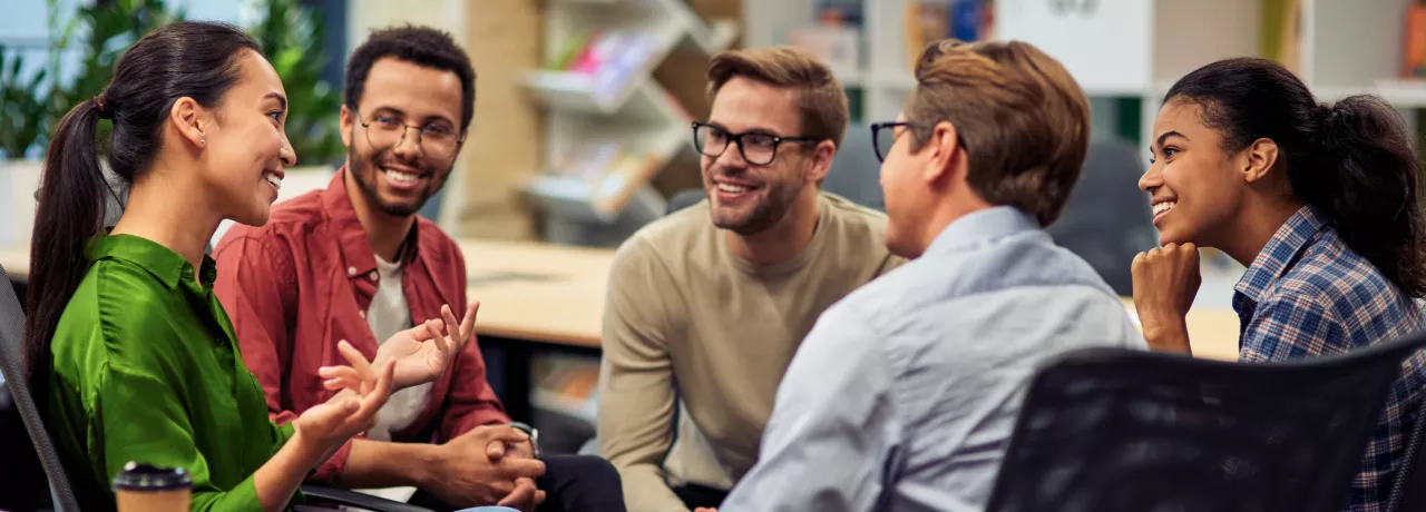 A group of colleagues talking to each other 