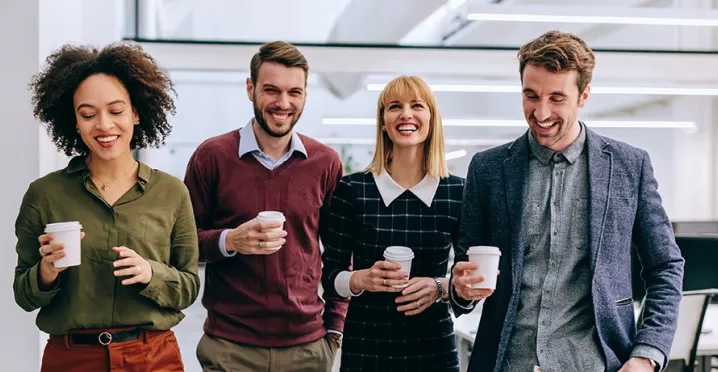 group walking with coffee