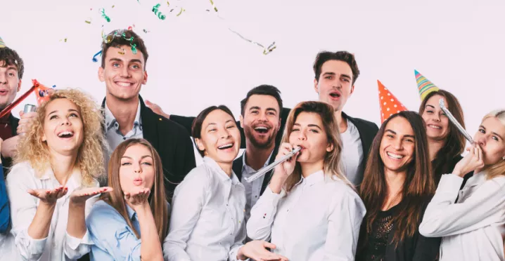 A group of co-workers celebrating at an office party
