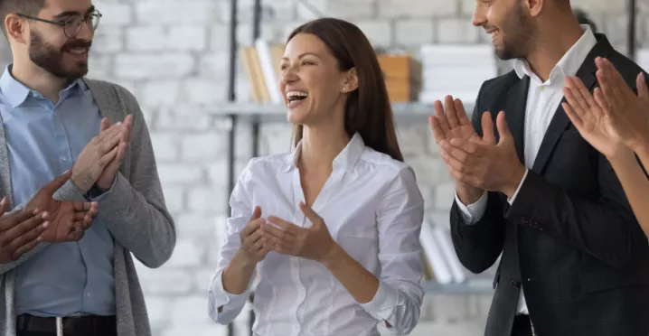 Employee being recognized by their team