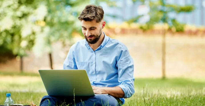An employee enjoying working outside during the summer