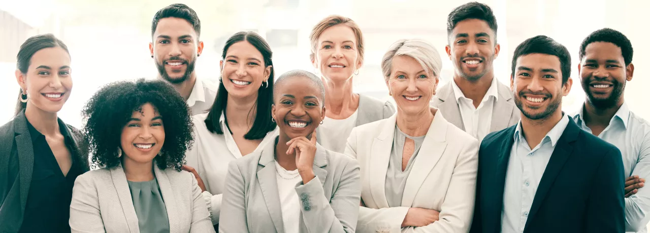 A group of employee smiling