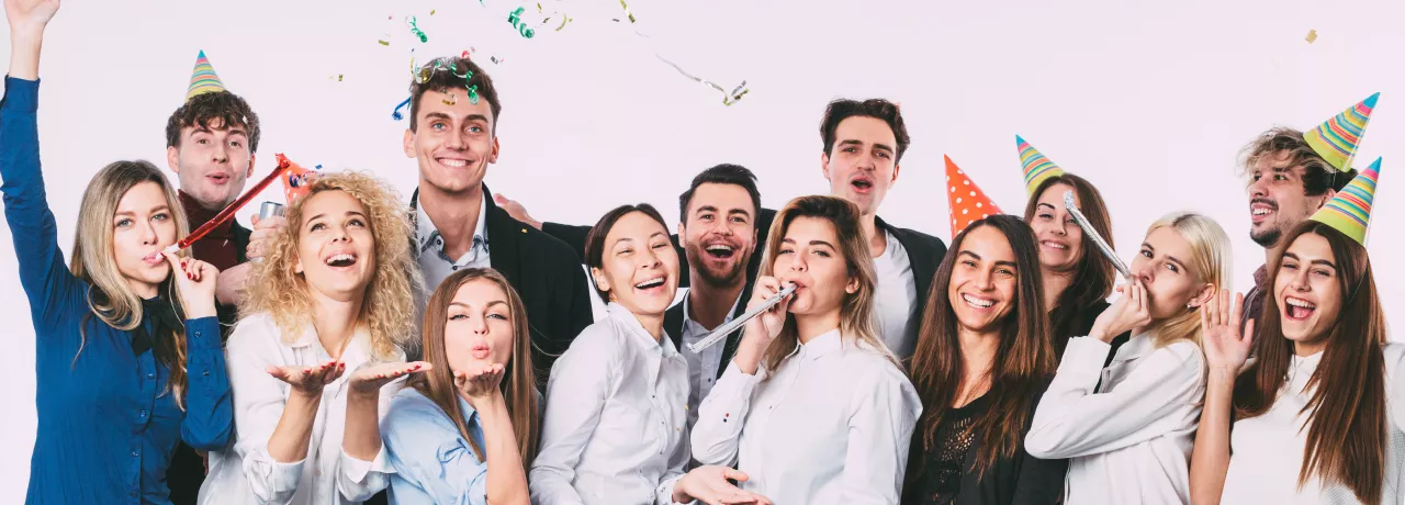 A group of co-workers celebrating at an office party