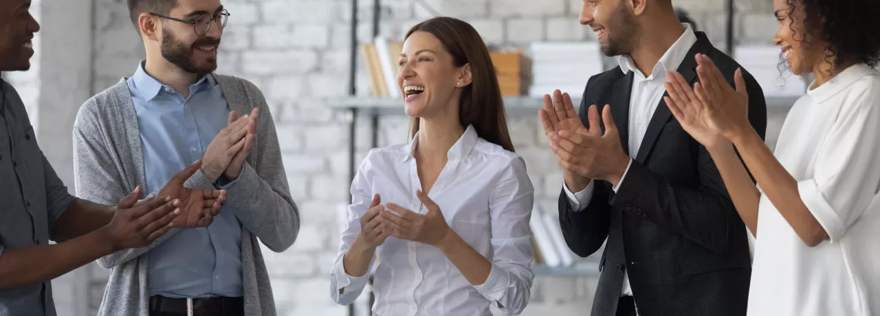 Employee being recognized by their team