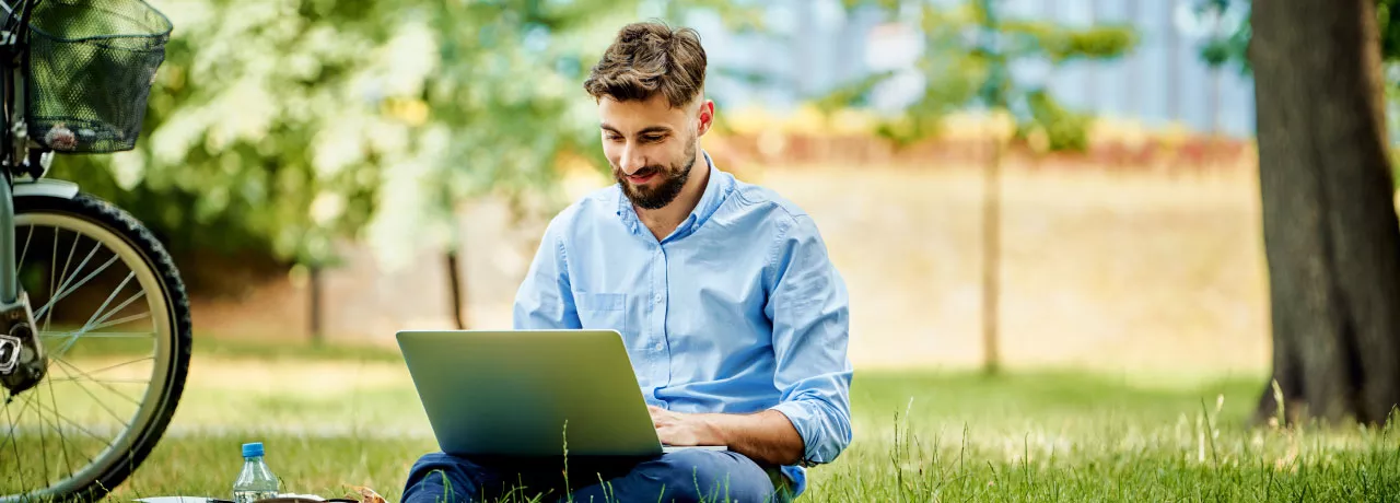 An employee enjoying working outside during the summer