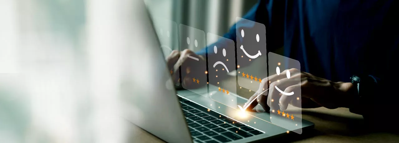 Employee sharing their thoughts and feelings in a HR survey on their laptop