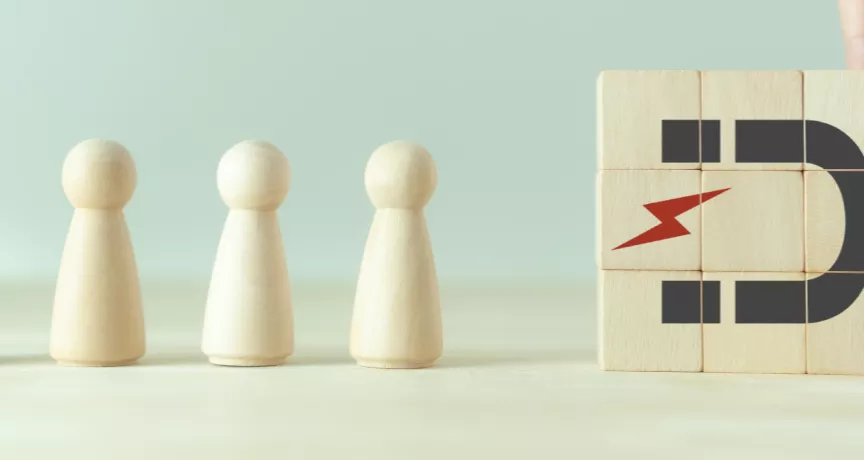 A photo that shows a magnet drawing in figures of people