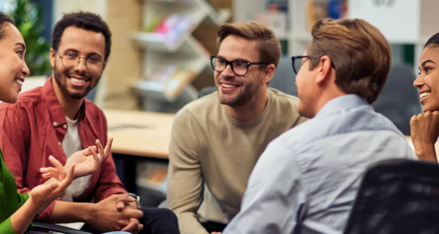 A group of colleagues talking to each other