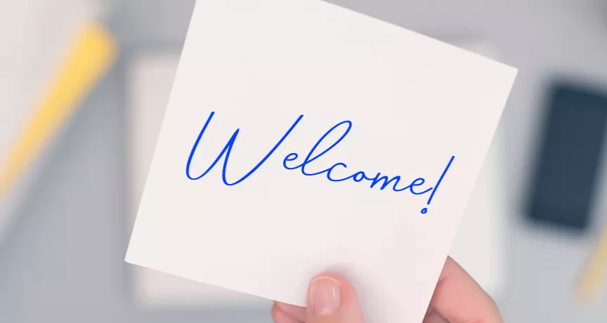 An image that shows a sticky note that says "Welcome!"