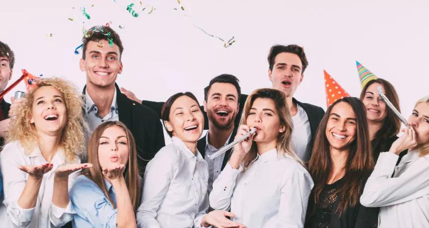 A group of co-workers celebrating at an office party