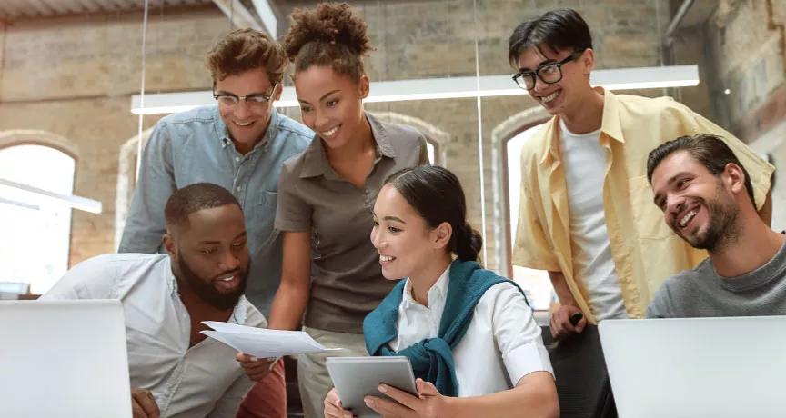 Team collaborating around a table at work