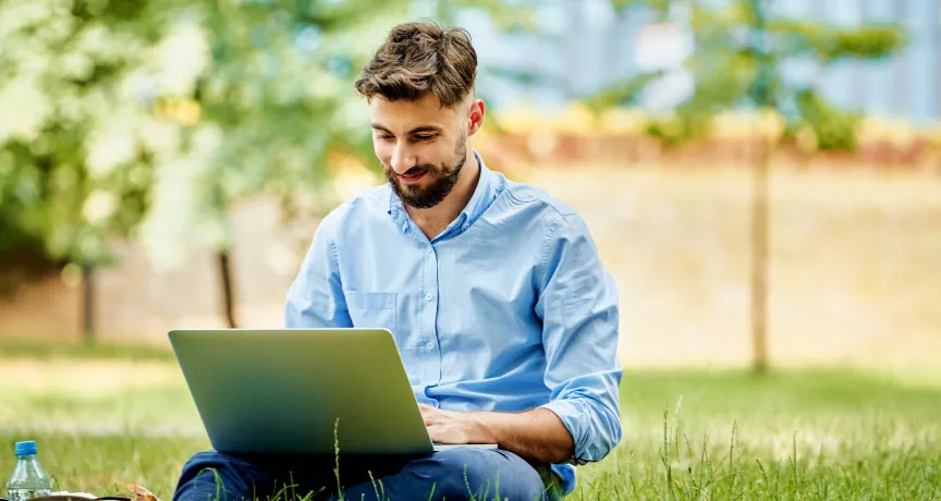 An employee enjoying working outside during the summer