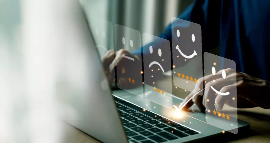 Employee sharing their thoughts and feelings in a HR survey on their laptop