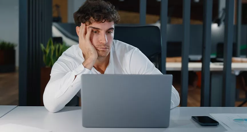 Businessperson unmotivated to make sales