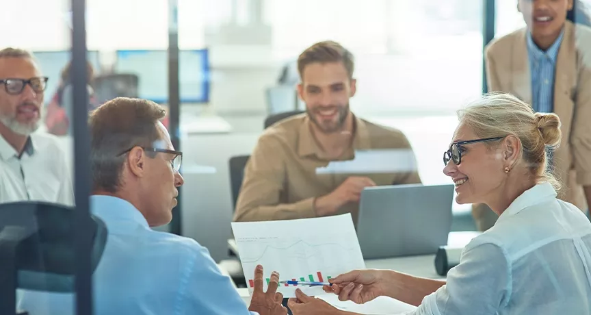 coworkers discussing results