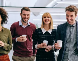 group walking with coffee