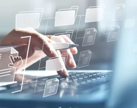Hands typing on a computer with transparent icons hovering in front