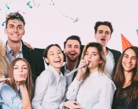 A group of co-workers celebrating at an office party