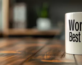 Shows a Boss's Day Message on a mug