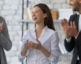 Employee being recognized by their team