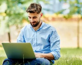 An employee enjoying working outside during the summer