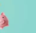Shows a piggy bank with coins floating above it
