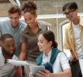 Team collaborating around a table at work