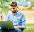 An employee enjoying working outside during the summer
