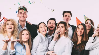 A group of co-workers celebrating at an office party