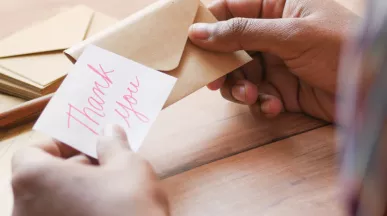 Customer service professional receiving thank you message for Customer Service Week