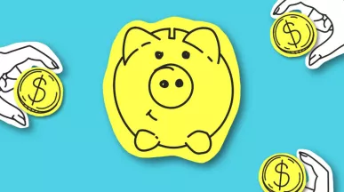 A piggy bank with coins surrounding it. 