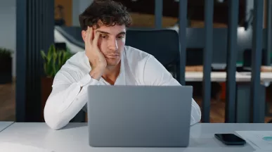 Businessperson unmotivated to make sales