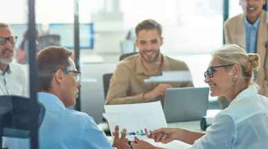 coworkers discussing results