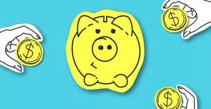A piggy bank with coins surrounding it.