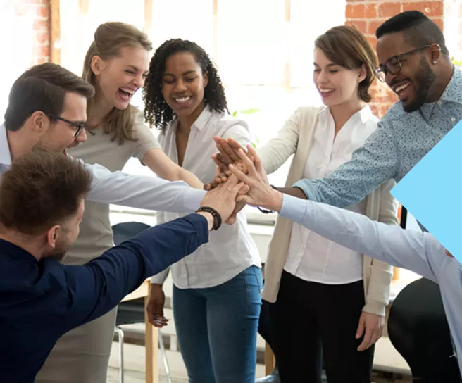 A team celebrating the launch of their eBooks and White papers.