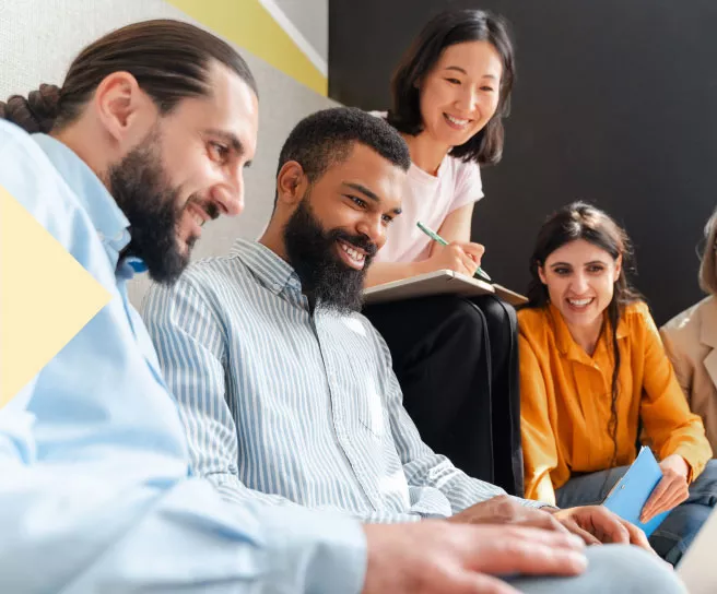 Employees collaborating on a project together