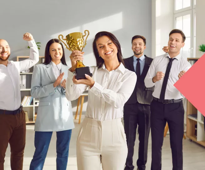 Team celebrating and recognizing their colleague